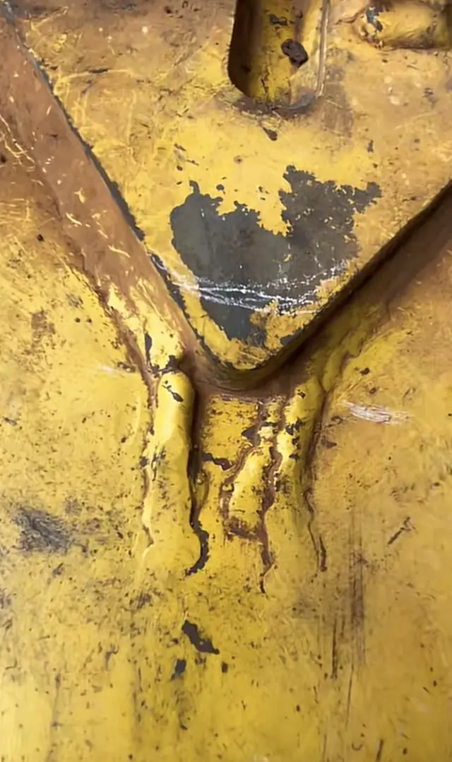 Crack in a heavy equipment plate before repair