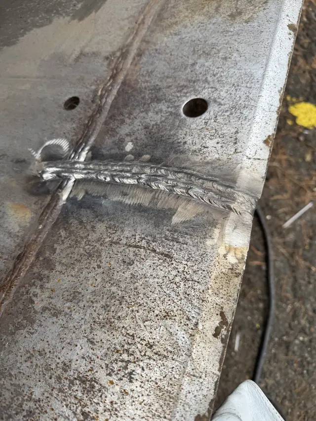 Loader bucket after crack repair and reinforcement