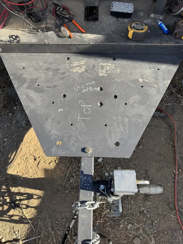 Fabricated steel base plate with bolt pattern, cut and drilled to fit