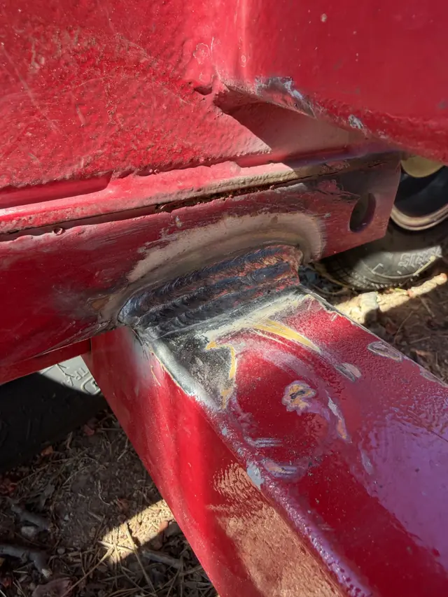 Cracked trailer frame joint at the axle before repair