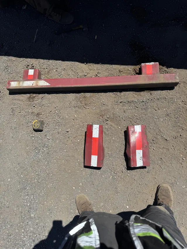 Damaged guard parts cut out and laid out on site